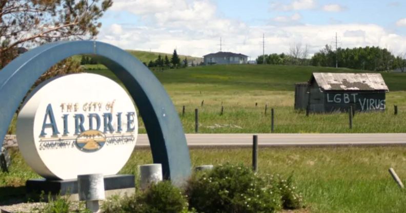 The term "LGBT virus" was daubed on a shed visible from the highway at the entrance to the city of Airdrie