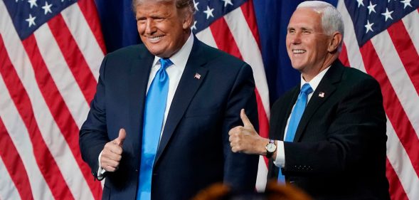 President Donald Trump and Vice President Mike Pence give a thumbs up after speaking on the first day of the Republican National Convention