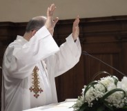 Gay clergyman disrobed re-instated Berlin Germany