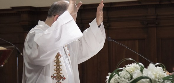 Gay clergyman disrobed re-instated Berlin Germany