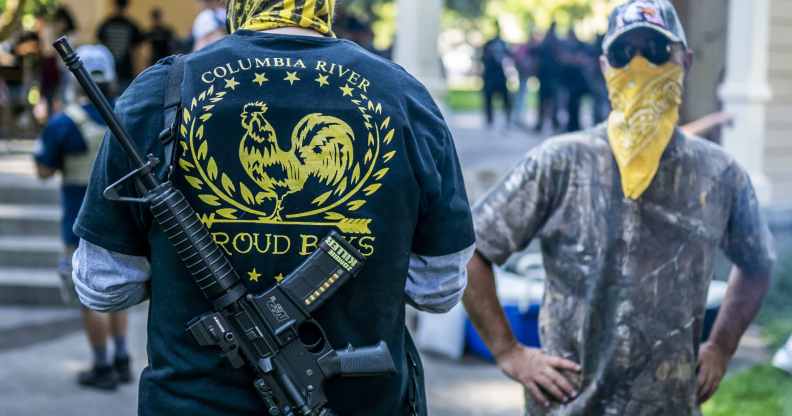 Armed members of the far-right Proud Boys group. (Nathan Howard/Getty Images)