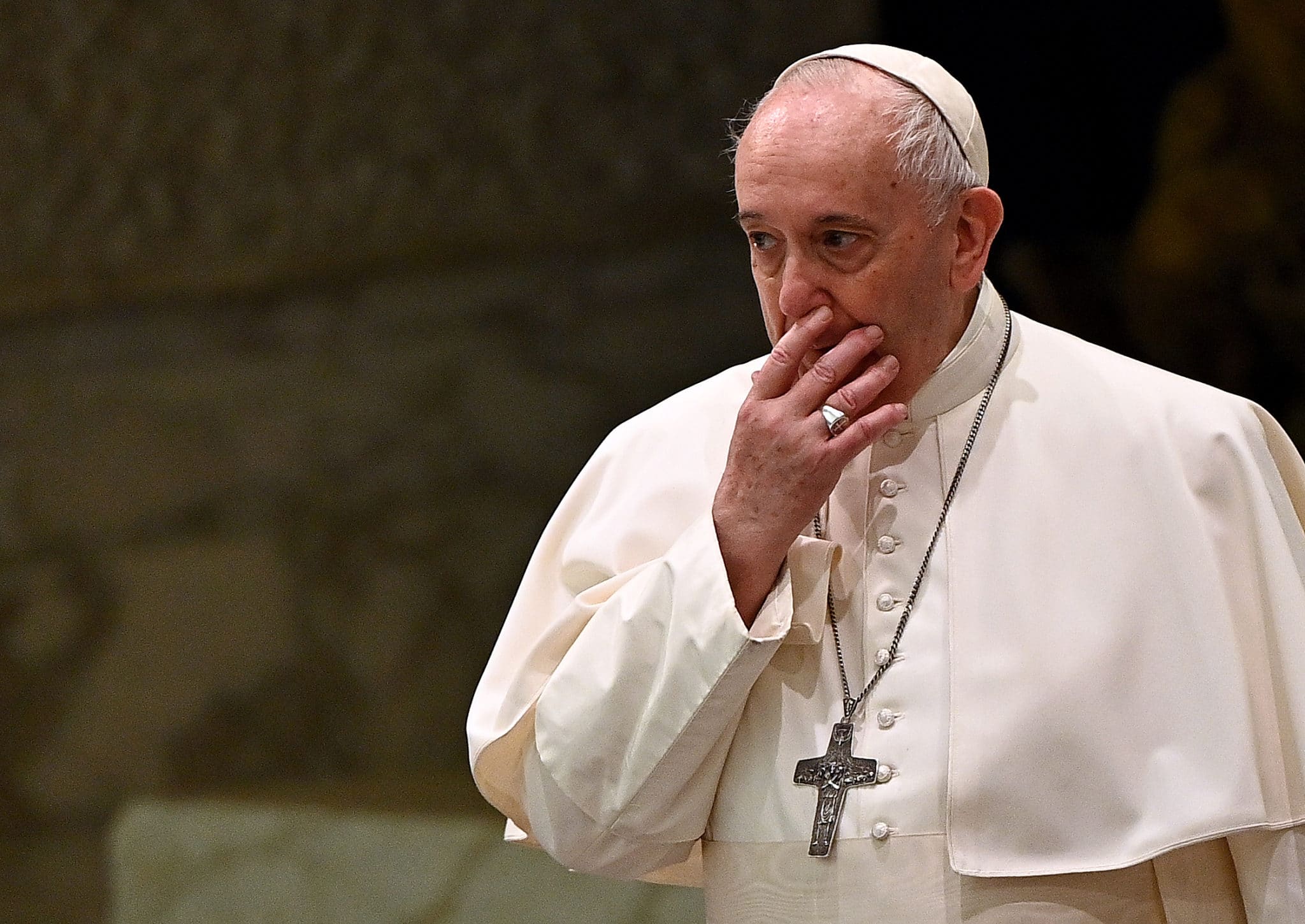 Pope Francis arrives to lead his weekly general audience in the Paul VI hall at the Vatican on October 21, 2020. 