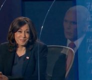 Kamala Harris smiling at Mike Pence