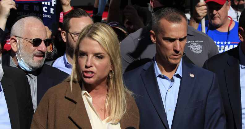 Former Florida Attorney General Pam Bondi, with Trump campaign adviser Corey Lewandowski (C R). (KENA BETANCUR/AFP via Getty Images)