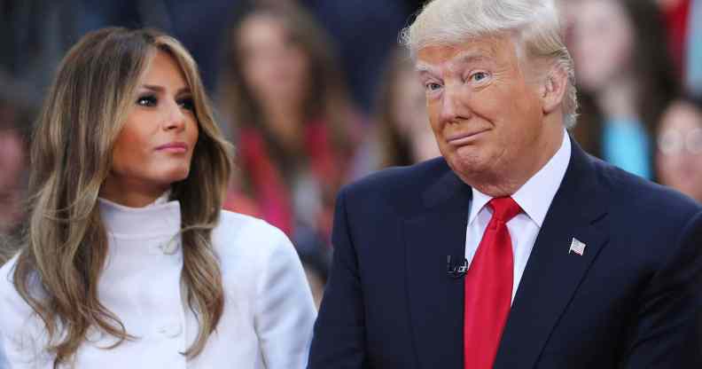 Donald Trump sits and his wife Melania Trump. (Spencer Platt/Getty Images)