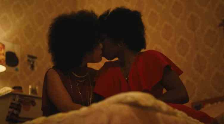 Two Black women kissing in Lovers Rock