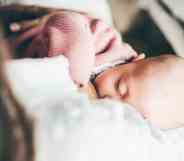 close up image of a baby feeding