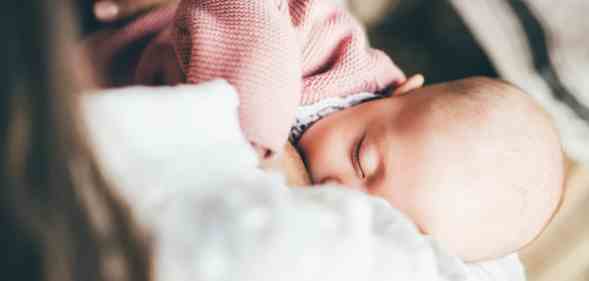 close up image of a baby feeding