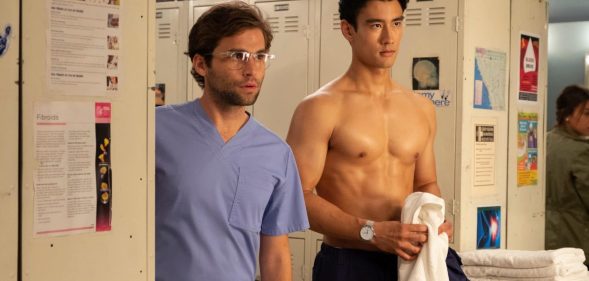 Jake Borelli as Dr Levi Schmitt and Alex Landi as Dr Nico Kim.