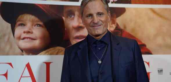 Danish-US actor Viggo Mortensen poses as he arrives the premiere of his new movie Falling in Copenhagen on October 26