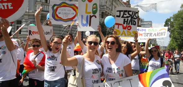 People hold flags and balloons as they take part in the Baltic Pride 2016 in Vilnius, Lithuania.