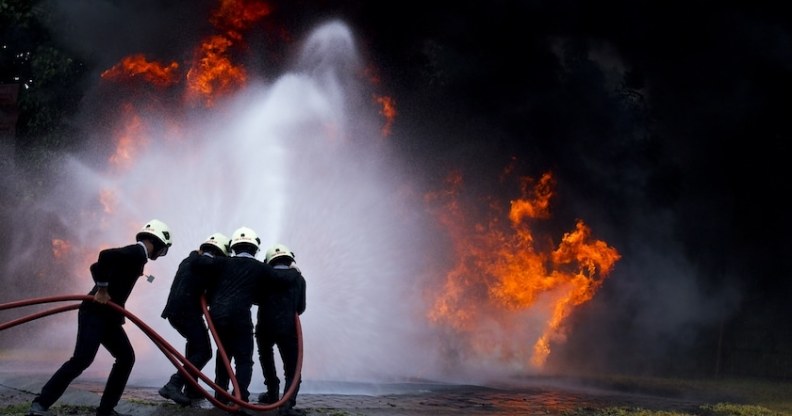 Firefighter putting out a fire