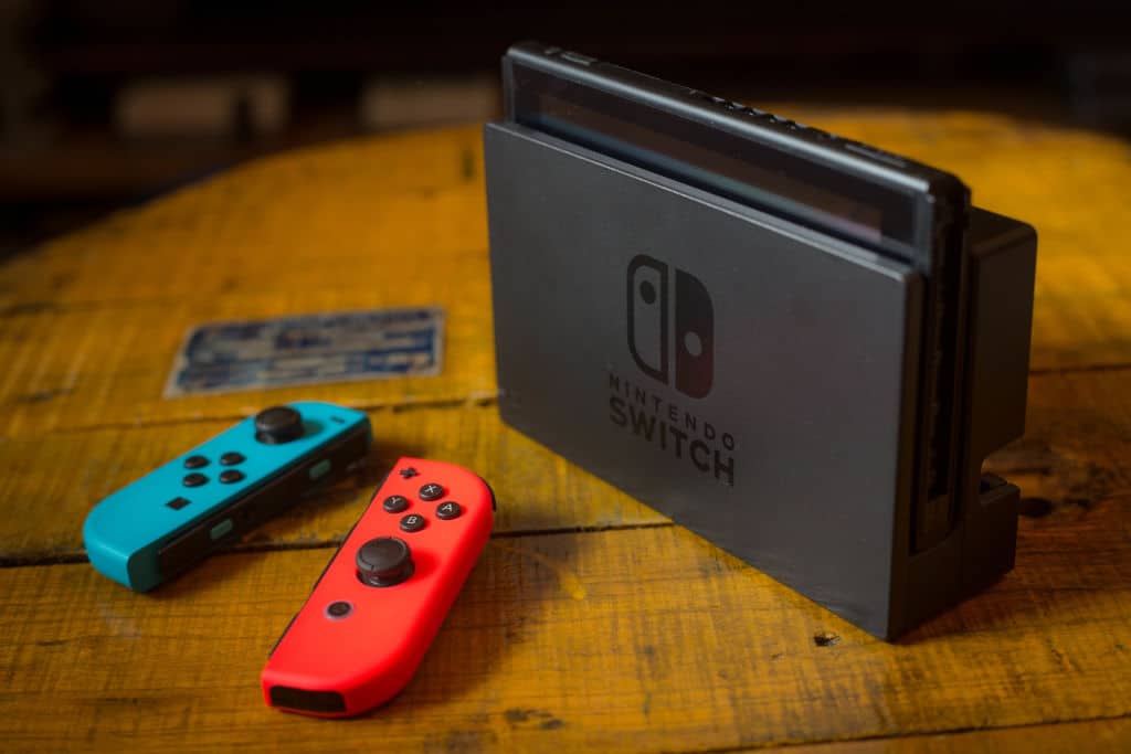 The Nintendo Switch console comes in neon red and blue.