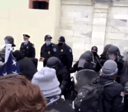 Protestors attempting to break into the Capitol.