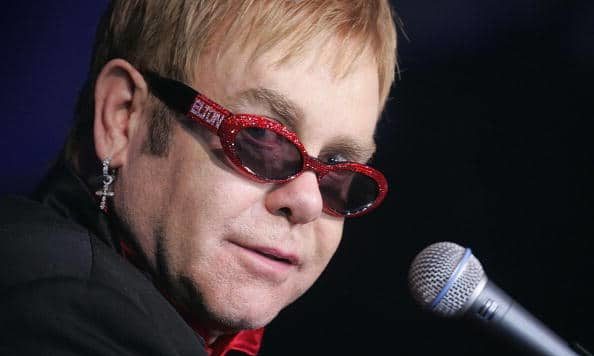 Elton John in bedazzled sunglasses