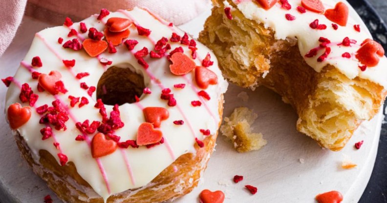 The love nut Yumnut, a croissant-doughnut covered in white icing and red hearts