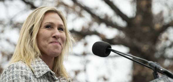 Majorie Taylor Greene qanon speaking before a crowd