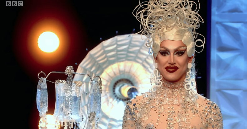 A'Whora, a drag queen, in a silver medusa-like headpiece and see-through jewelled dress