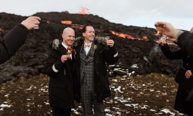 Gay couple tie the knot at the foot of an erupting Icelandic volcano