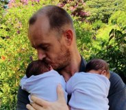 Phillip Lühl and his twin daughters in South Africa