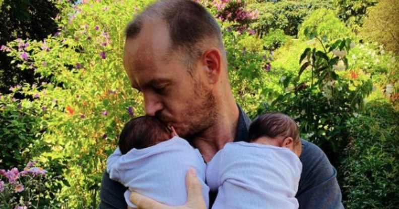 Phillip Lühl and his twin daughters in South Africa