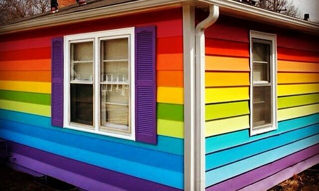 House opposite Westboro Baptist Church painted in Pride flag colours