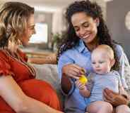 happy same-sex couple celebrating children