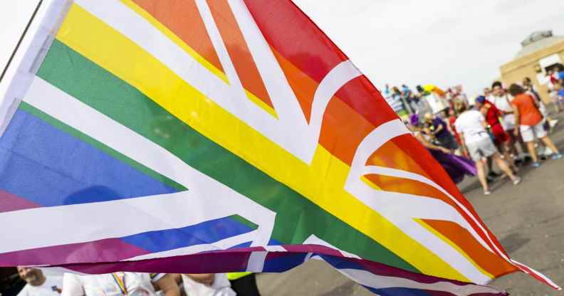 A rainbow Union Jack during Brighton Pride Parade