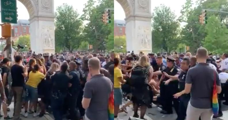 With the arch visible, police pack the streets outside Washington Square Park