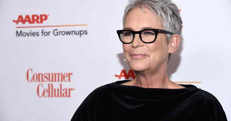 Jamie Lee Curtis wearing black top on the red carpet