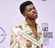 Lil Nas X in a floral suit with a super-wide lapel