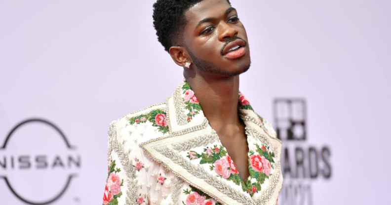 Lil Nas X in a floral suit with a super-wide lapel