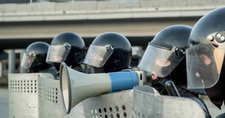 Police riot gear anti-sodomy gay sex raid