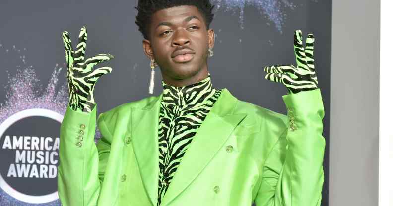 Lil Nas X wears neon green suit at the American Music Awards