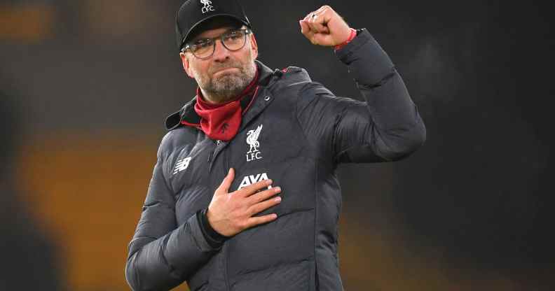 Liverpool manager Jürgen Klopp raises his fist in the air