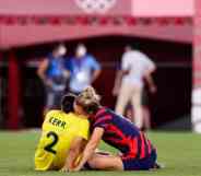 Team USA's Kristie Mewis Sam Kerr Australia after the Olympic football bronze medal match LGBT+ couple