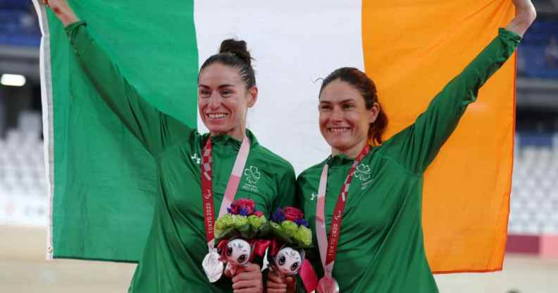 Silver medalists Katie-George Dunlevy and pilot Eve McCrystal of Team Ireland pose during the women's B 3000m Individual pursuit track cycling medal ceremony on day 4 of the Tokyo 2020 Paralympic Games at Izu Velodrome on August 28, 2021 in Izu, Japan.