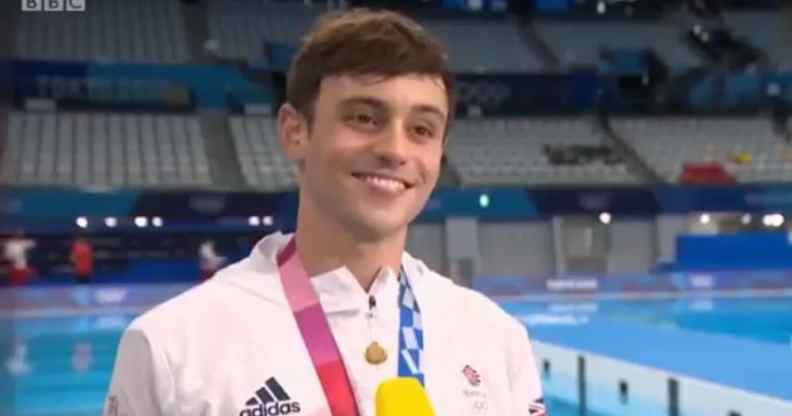 Tom Daley with his Olympic medal round his neck