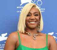 Tiffany Haddish attends a photocall for the film "The Card Counter" presented in competition during the Venice Film Festival in a gorgeous green dress