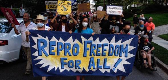 Activists march to US supreme court justice Brett Kavanaugh's house, following the court's decision to uphold Texas' stringent abortion law.