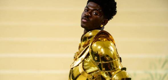 Lil Nas X attends the 2021 Met Gala in a gorgeous golden suit of armour