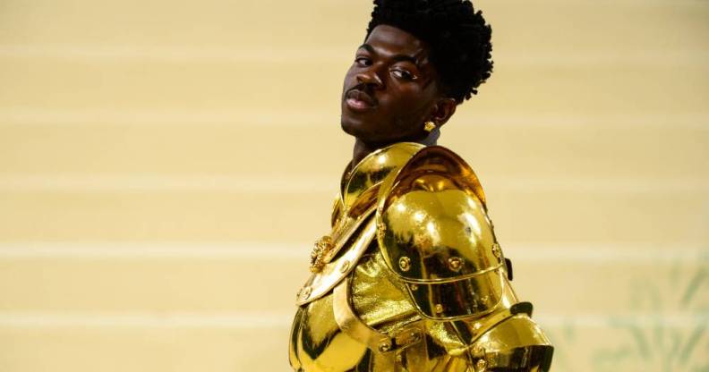 Lil Nas X attends the 2021 Met Gala in a gorgeous golden suit of armour