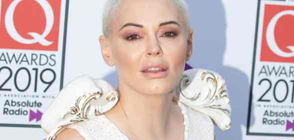 Rose McGowan attends the Q Awards 2019 in a pale outfit