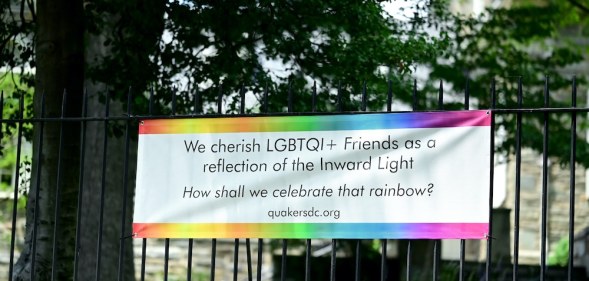 A banner to welcome LGBT+ visitors at a Quaker meeting house in Washington, DC.