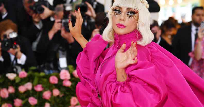 Lady Gaga in a cerise dress at the Met Gala in 2019