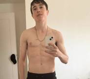 Elliot Page taking a topless mirror selfie