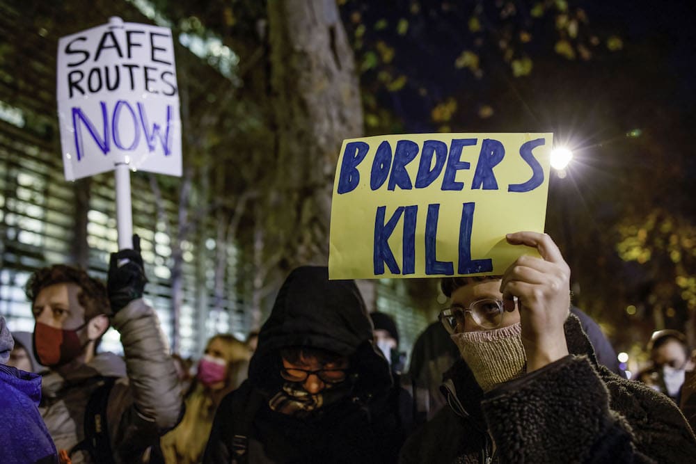 Protesters gather outside the Home Office