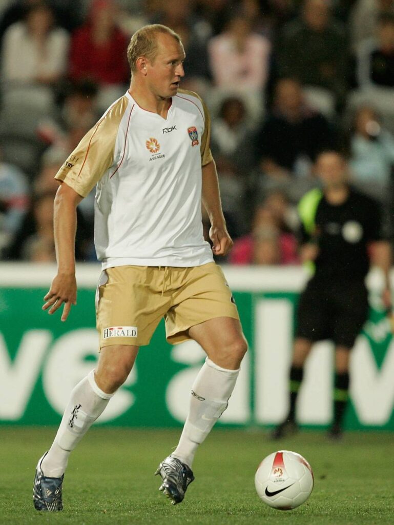 Stephen Laybutt of the Newcastle Jets runs with the ball during an A-League match against the Central Coast Mariners