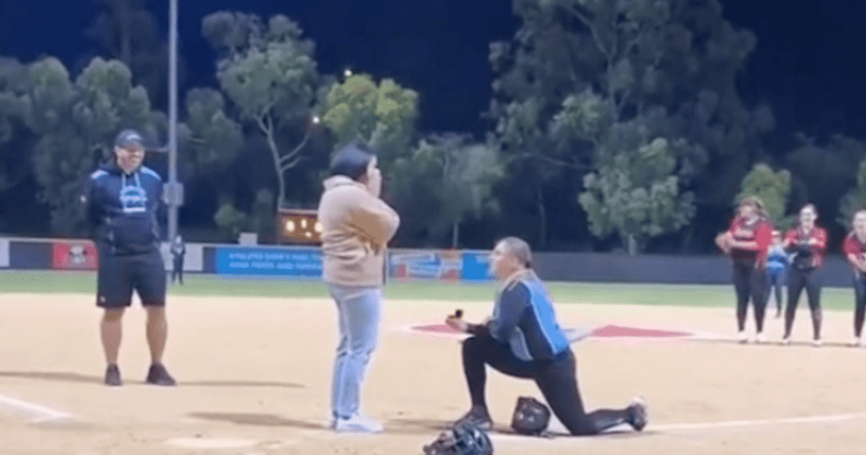 Woman pops the question to fiancée by faking softball injury in “epic proposal”