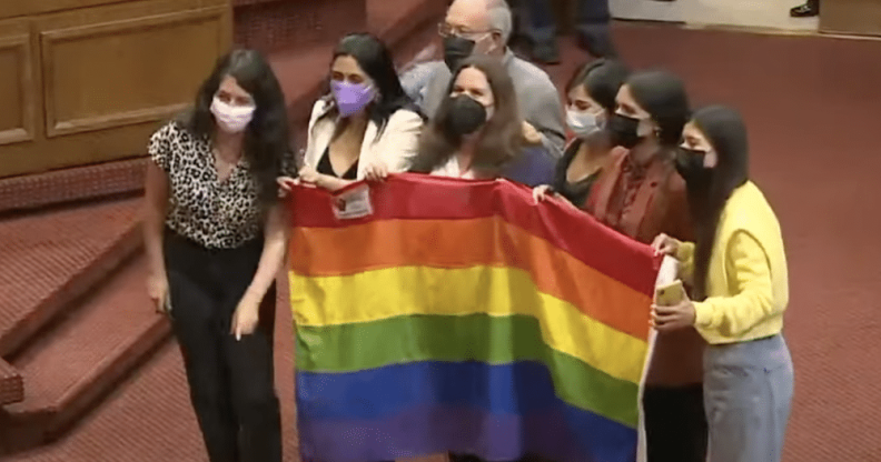 Members of Chile's congress pose for a photo after the historic same-sex marriage vote